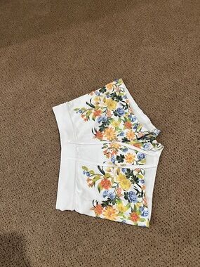 Beach Riot White Floral Shorts with Yellow, Orange & Blue Blooms